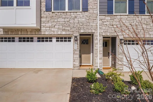 a front view of a building with an outdoor space