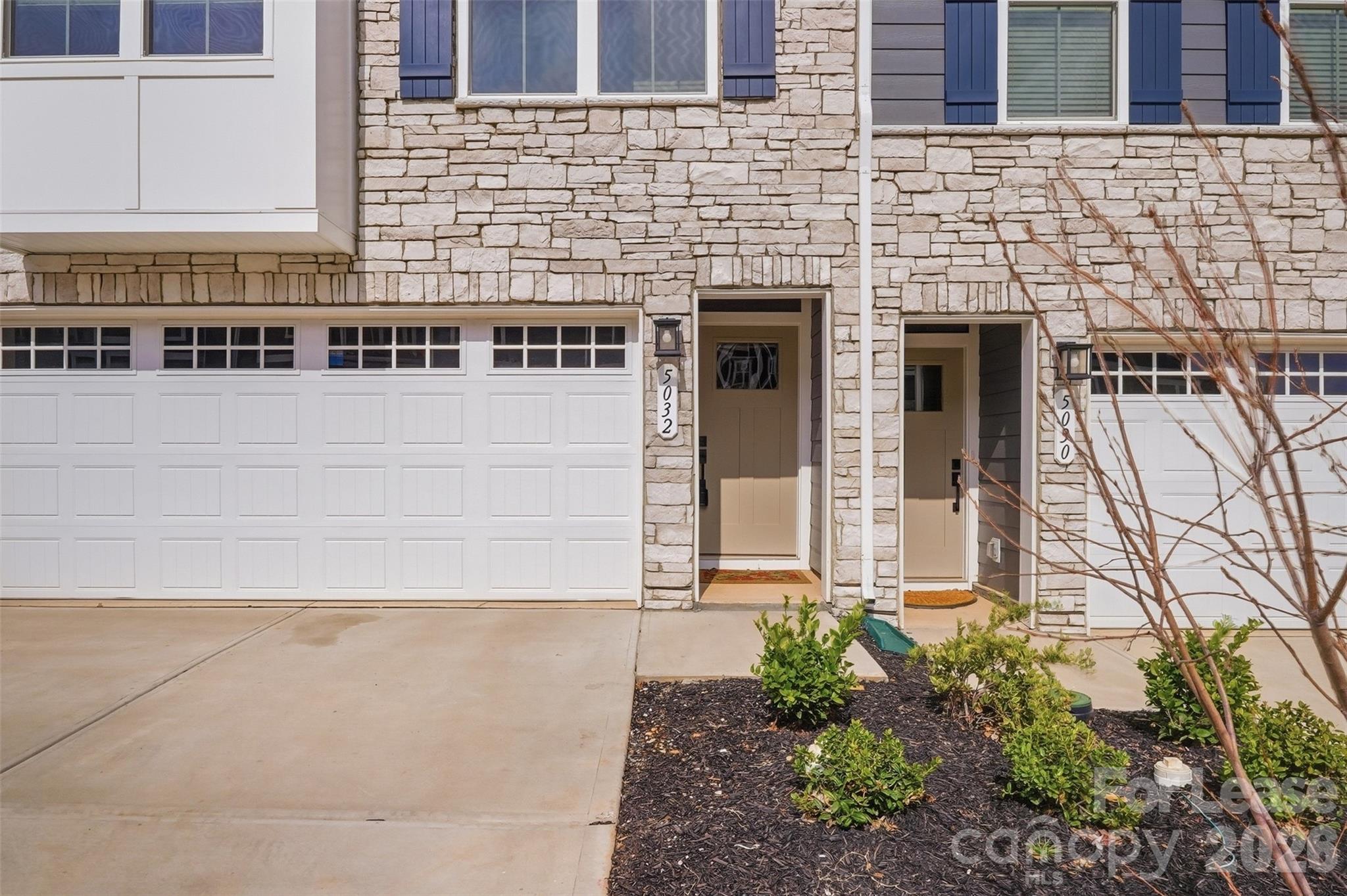 5032 Grain Orchard Road Indian Trail, NC 28079 - Photo 25 of 26 a front view of a building with an outdoor space