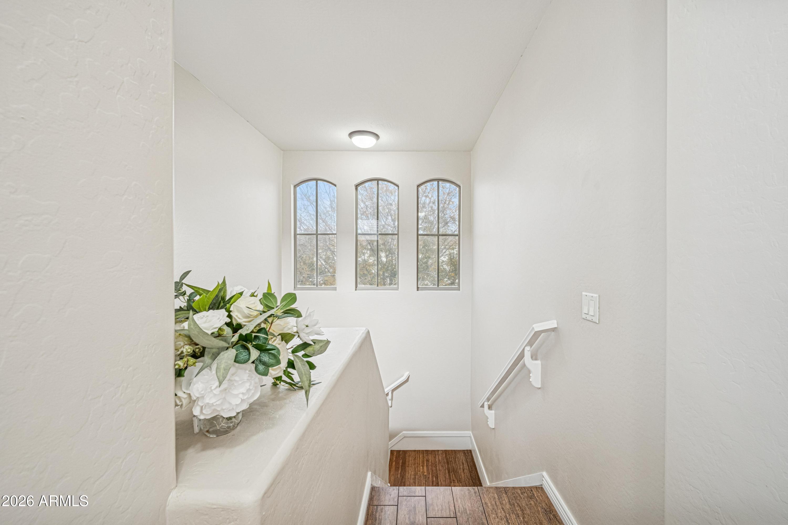 3942 South Mandarin Way Gilbert, AZ 85297 - Photo 12 of 32 a view of entryway with wooden floor