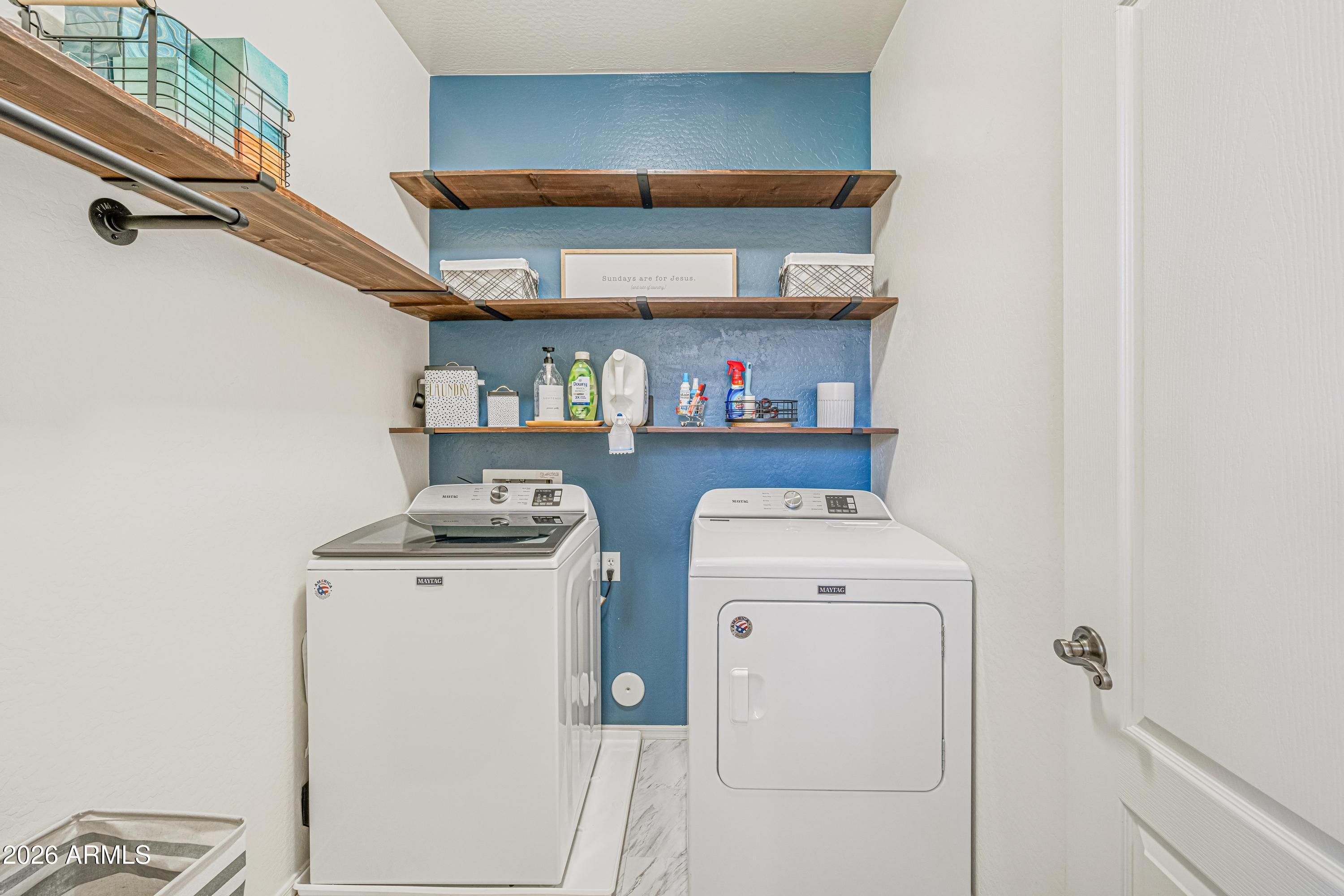 3942 South Mandarin Way Gilbert, AZ 85297 - Photo 20 of 32 a utility room with dryer and washer