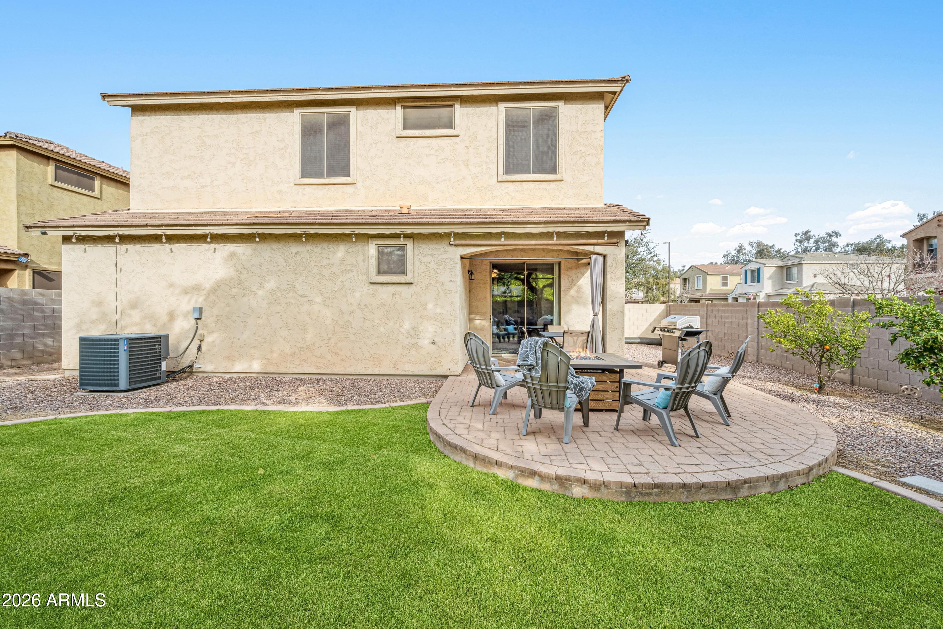 3942 South Mandarin Way Gilbert, AZ 85297 - Photo 28 of 32 a view of a house with backyard porch and sitting area