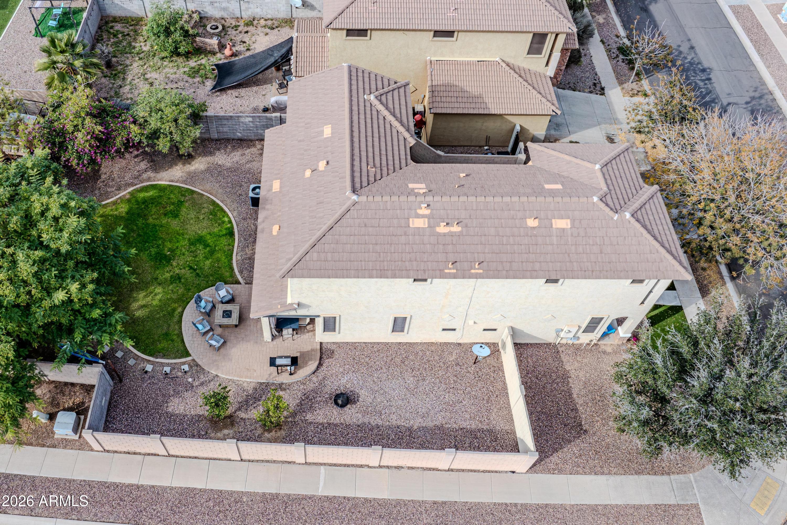 3942 South Mandarin Way Gilbert, AZ 85297 - Photo 30 of 32 an aerial view of a house with a yard