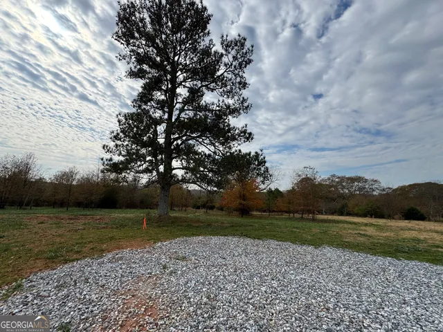a view of a lake with a yard