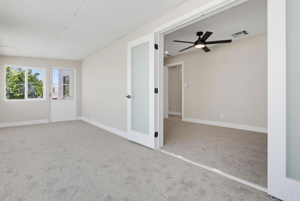 650 South Rancho Santa Fe Road, Unit 52 San Marcos, CA 92078 - Photo 14 of 22 The patio room has an exit/entrance to the backyard. So great for entertaining or just relaxing!