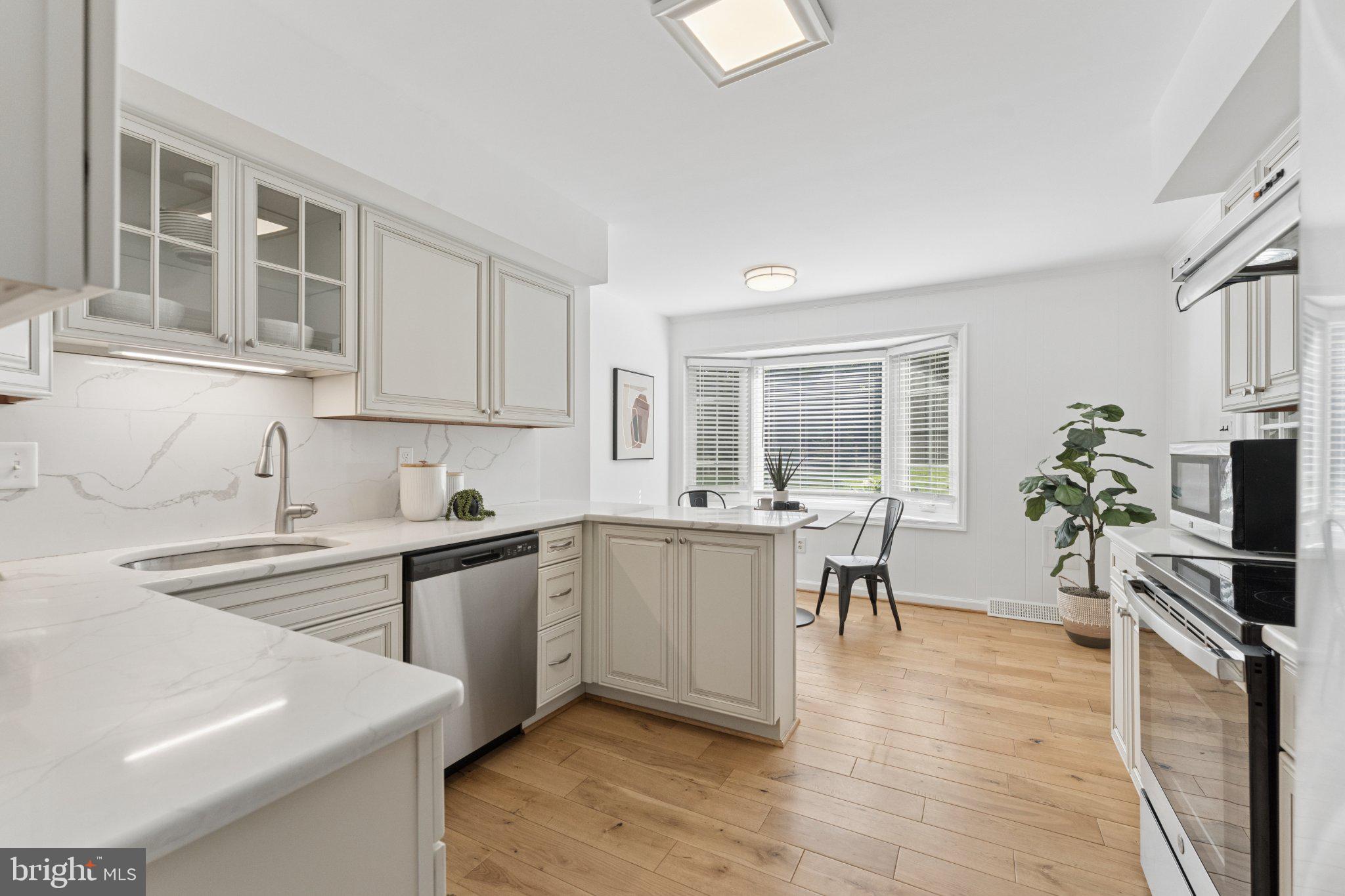 3219 Fox Mill Road Oakton, VA 22124 - Photo 25 of 87 Bright and airy modern kitchen space.