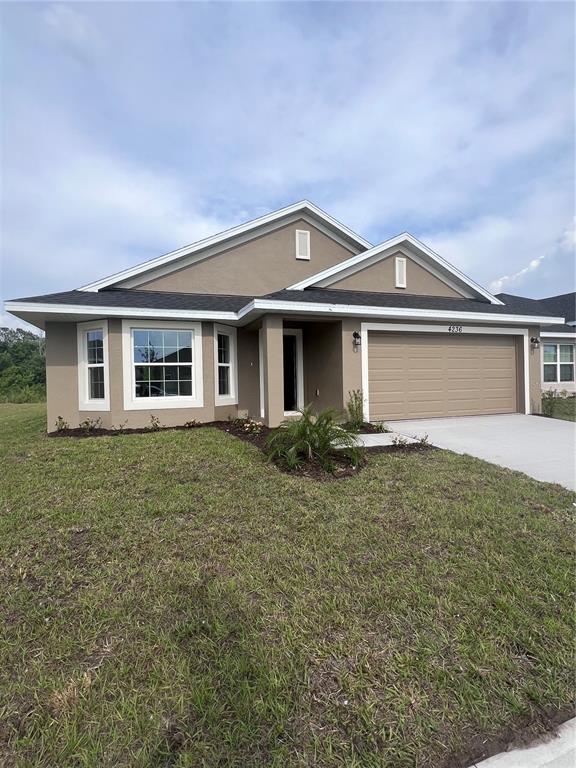 front view of house with a yard
