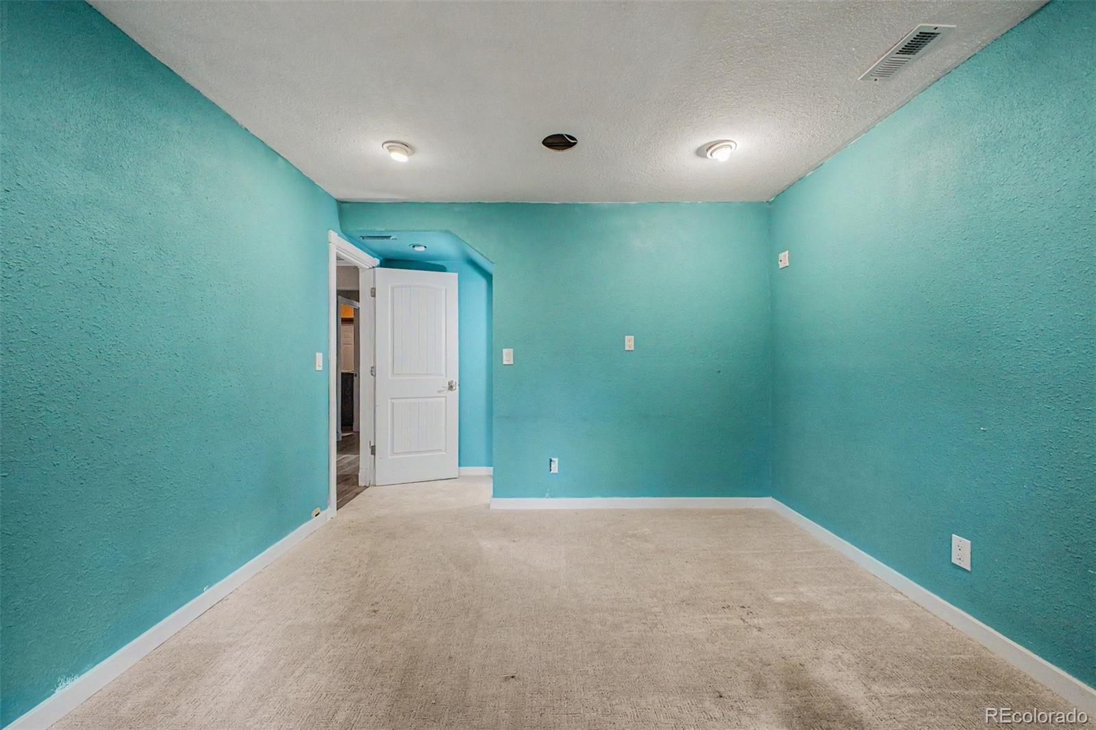 76 Highlands Drive Bailey, CO 80421 - Photo 24 of 49 a view of a big room with closet and windows