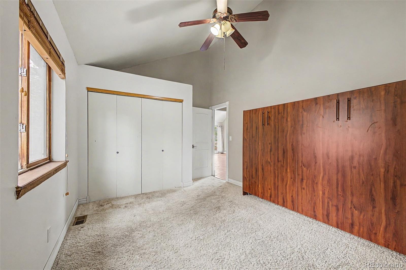 76 Highlands Drive Bailey, CO 80421 - Photo 25 of 49 a view of a room with a wooden door