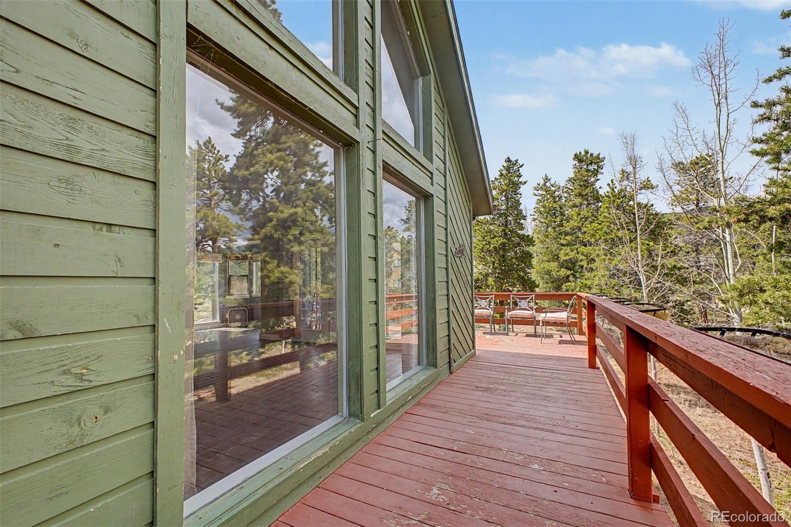 76 Highlands Drive Bailey, CO 80421 - Photo 5 of 49 a balcony with view of outdoor space