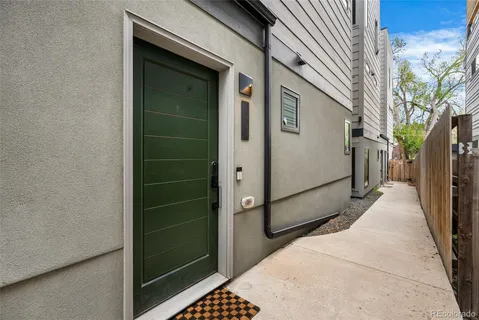 a view of a house with a door and a door