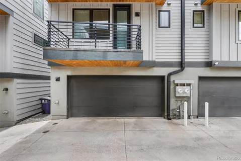 a front view of a house with garage