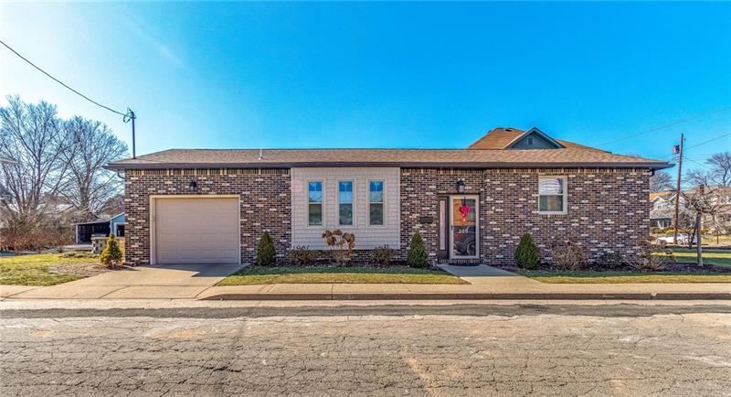 THIS HOME IS ALMOST A RANCH WITH JUST ABOUT 3 STEPS TO THE MAIN LEVEL! 