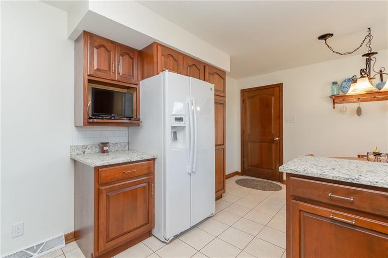 385 Navigation Street Beaver, PA 15009 - Photo 11 of 20 BUILT-IN NEW FRIDGE, DOOR TO ATTACHED GARAGE