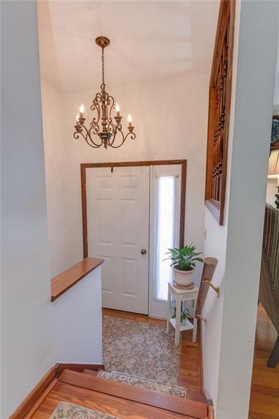 FRONT ENTRY HAS JUST A 3 STEPS TO LIVING ROOM! BEAUTIFUL CHANDELIER
