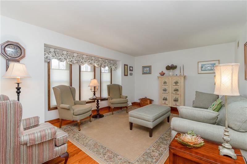 GLEAMING HARDWOOD FLOORS, NEW WINDOWS WITH TOP DOWN/BOTTOM UP SHADES!