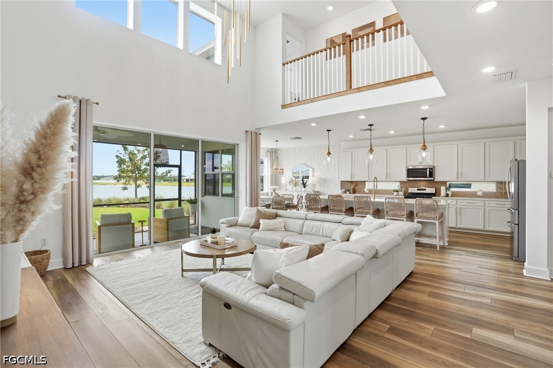 15572 Northridge Road Punta Gorda, FL 33982 - Photo 12 of 48 a living room with furniture and a large window