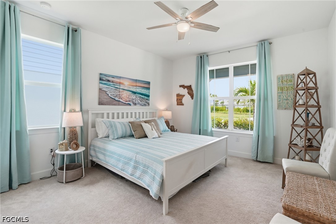 15572 Northridge Road Punta Gorda, FL 33982 - Photo 19 of 48 a bedroom with a bed and a window