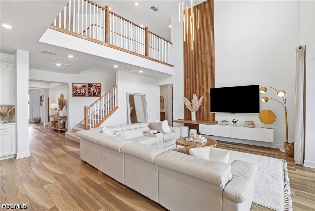 15572 Northridge Road Punta Gorda, FL 33982 - Photo 2 of 48 a living room with furniture and a flat screen tv
