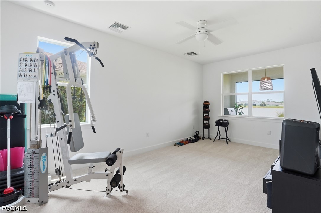 15572 Northridge Road Punta Gorda, FL 33982 - Photo 21 of 48 a view of a room with gym equipment