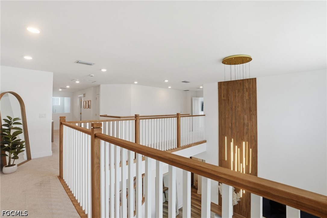 15572 Northridge Road Punta Gorda, FL 33982 - Photo 23 of 48 a view of a hallway with seating area