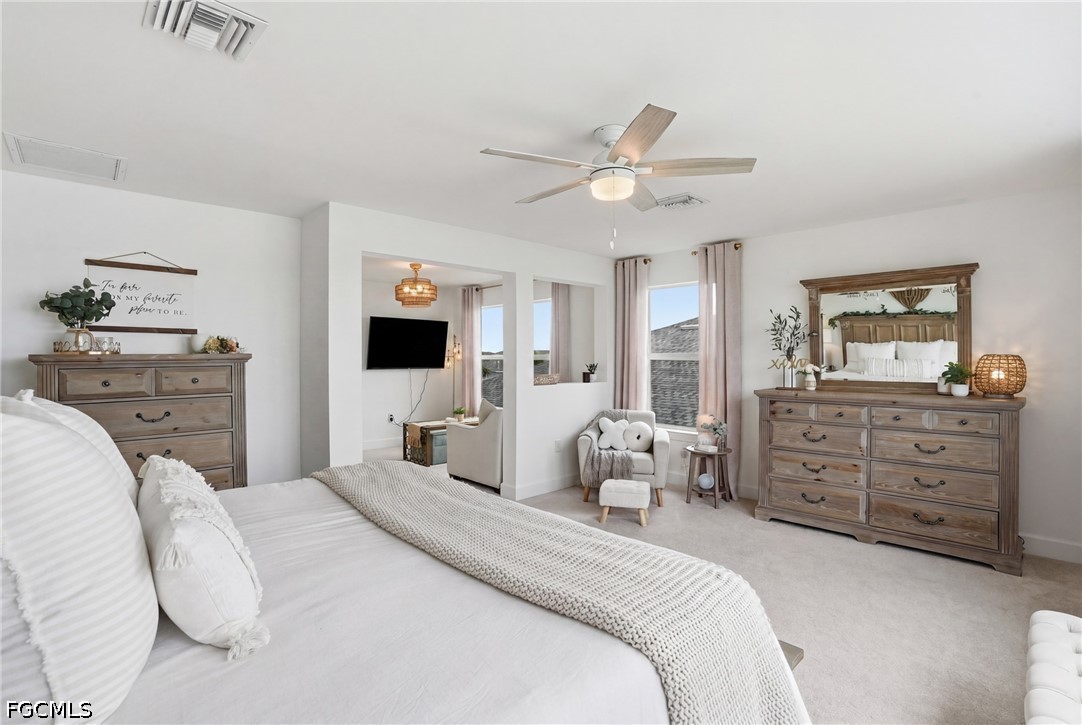 15572 Northridge Road Punta Gorda, FL 33982 - Photo 28 of 48 a bedroom with a bed and a dresser