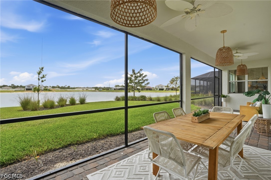15572 Northridge Road Punta Gorda, FL 33982 - Photo 43 of 48 a view of a patio with a table chairs and garden