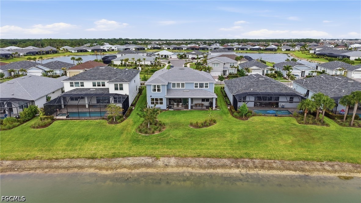 15572 Northridge Road Punta Gorda, FL 33982 - Photo 47 of 48 an aerial view of a house with a garden and lake view