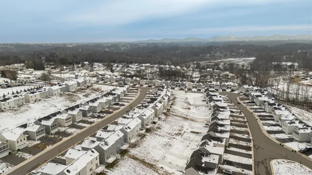 a black and white photo of a living room
