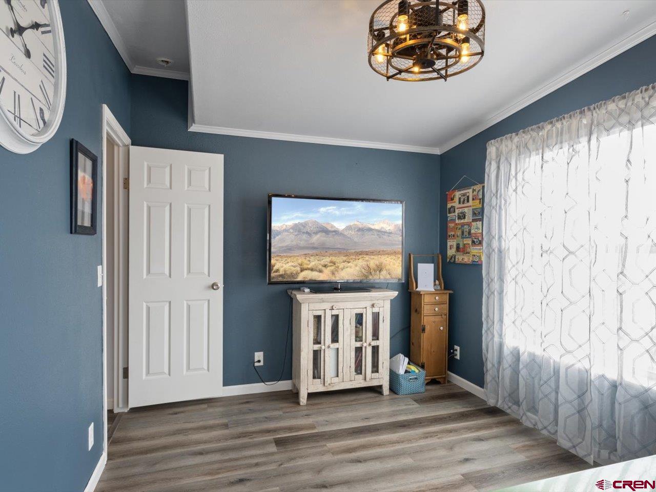 1857 Sego Lane Delta, CO 81416 - Photo 13 of 34 a view of livingroom with hardwood floor and hallway