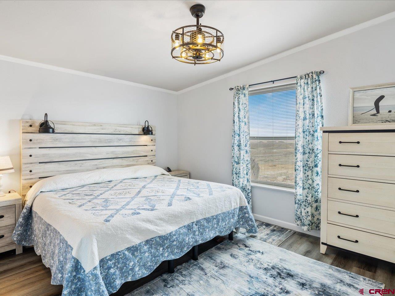 1857 Sego Lane Delta, CO 81416 - Photo 17 of 34 a bedroom with a bed and a window