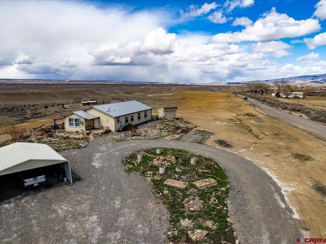 1857 Sego Lane Delta, CO 81416 - Photo 27 of 34 an aerial view of a house with a ocean view