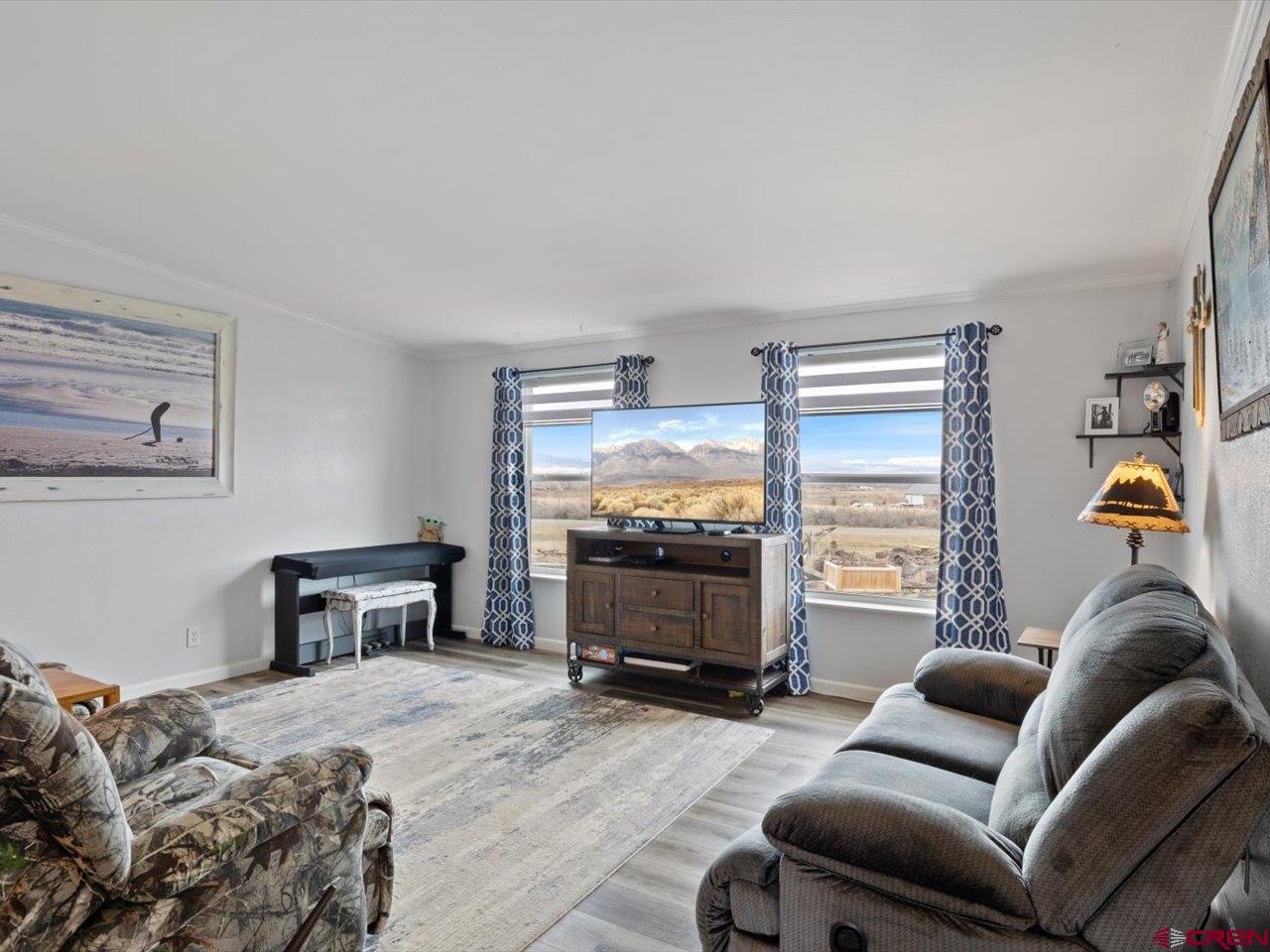 1857 Sego Lane Delta, CO 81416 - Photo 5 of 34 a bedroom with furniture and a window