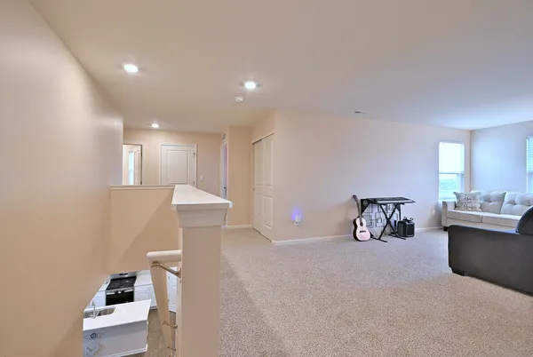 a view of livingroom with furniture and wooden floor
