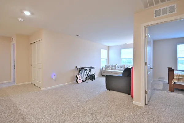 a view of livingroom with furniture and window