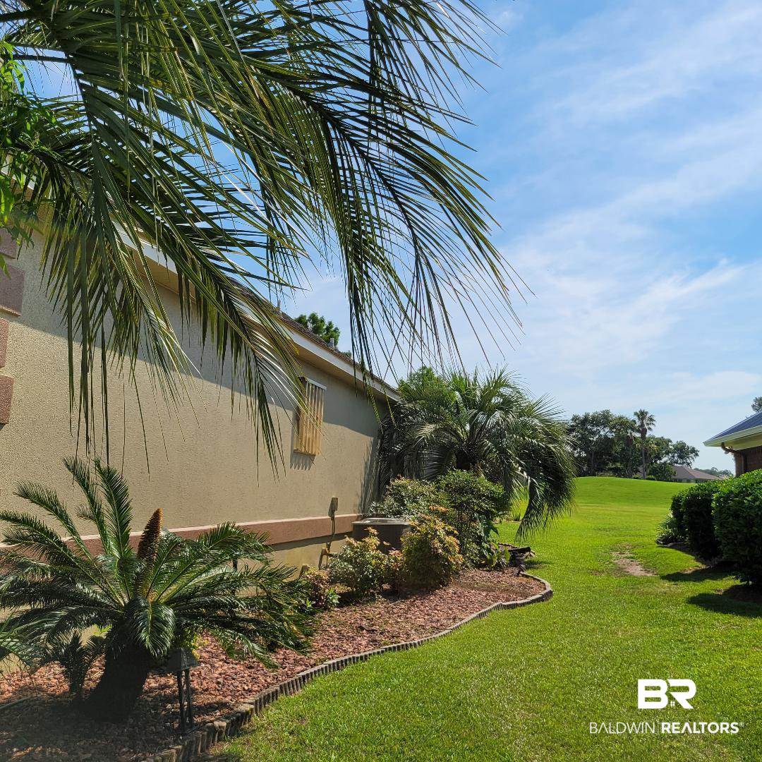 9185 Lakeview Drive Foley, AL 36535 - Photo 20 of 49 SIDE OF YARD TO GOLF COUR