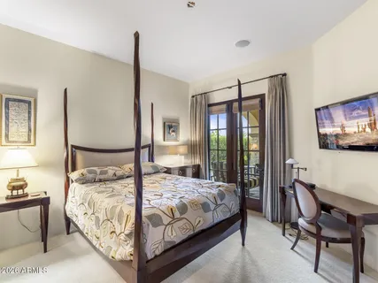 a kitchen with granite countertop a sink and stove