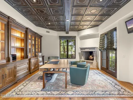 a view of a backyard with swimming pool