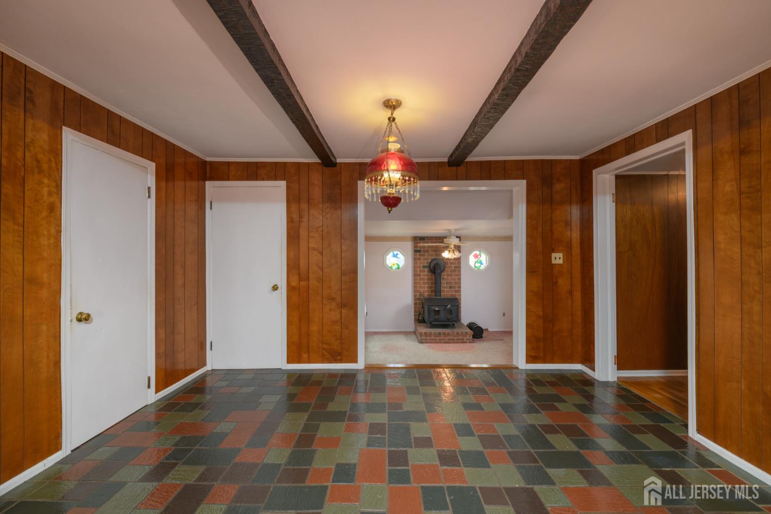 110 Sheppard Place Fords, NJ 08863 - Photo 12 of 34 a view of a hallway with a chandelier
