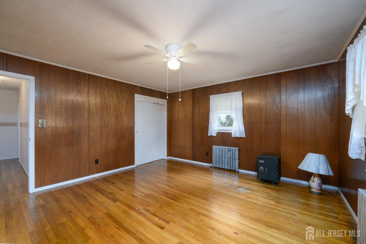 110 Sheppard Place Fords, NJ 08863 - Photo 21 of 34 a view of empty room with wooden floor
