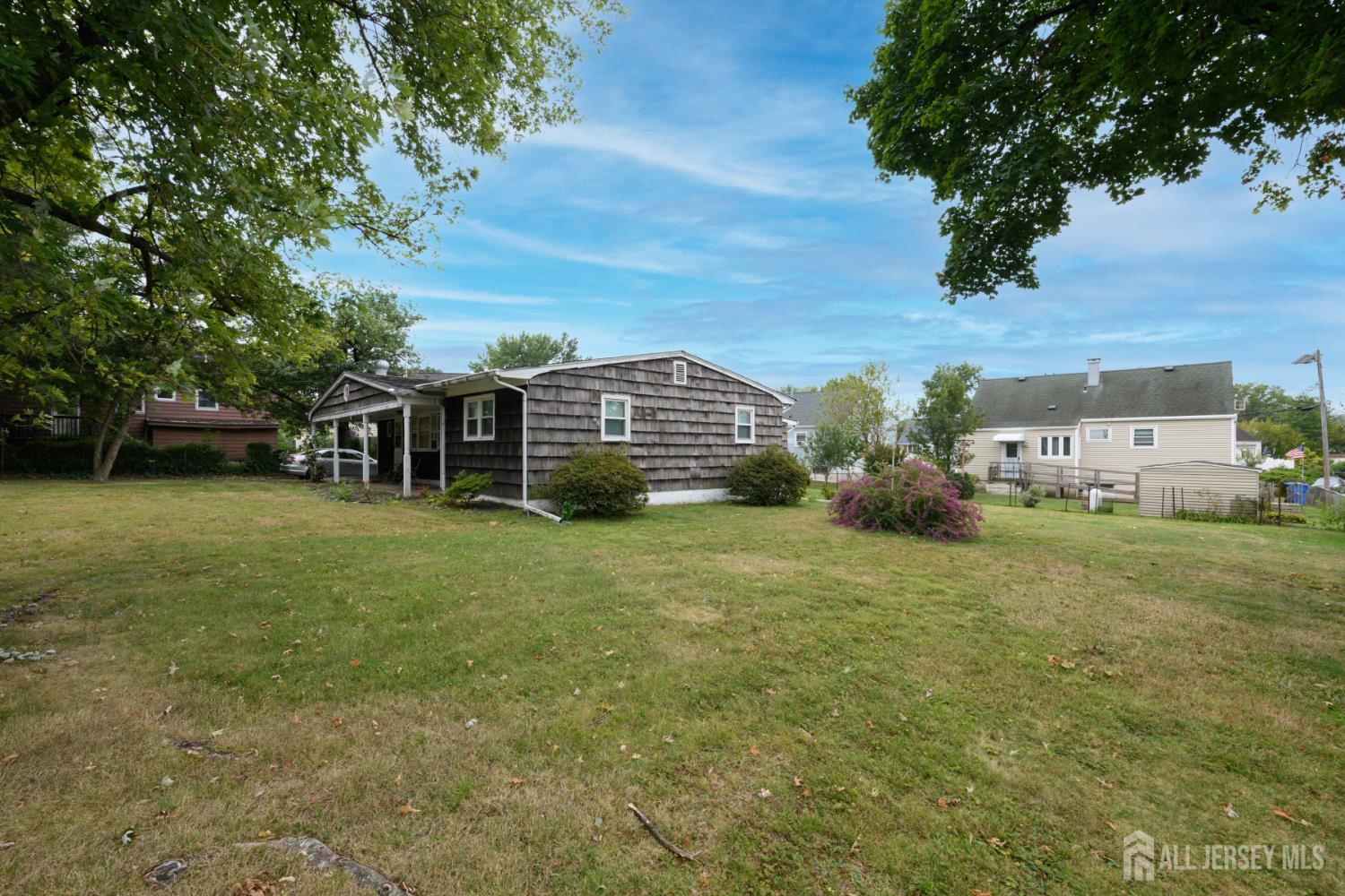 110 Sheppard Place Fords, NJ 08863 - Photo 23 of 34 a view of a house with a big yard