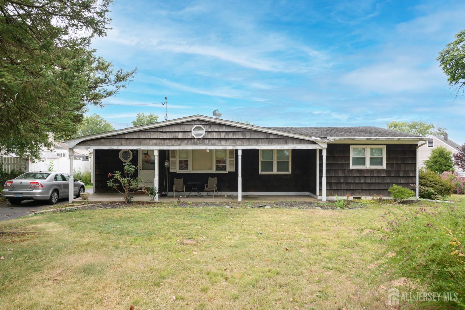 110 Sheppard Place Fords, NJ 08863 - Photo 27 of 34 a backyard of a house with yard and outdoor seating