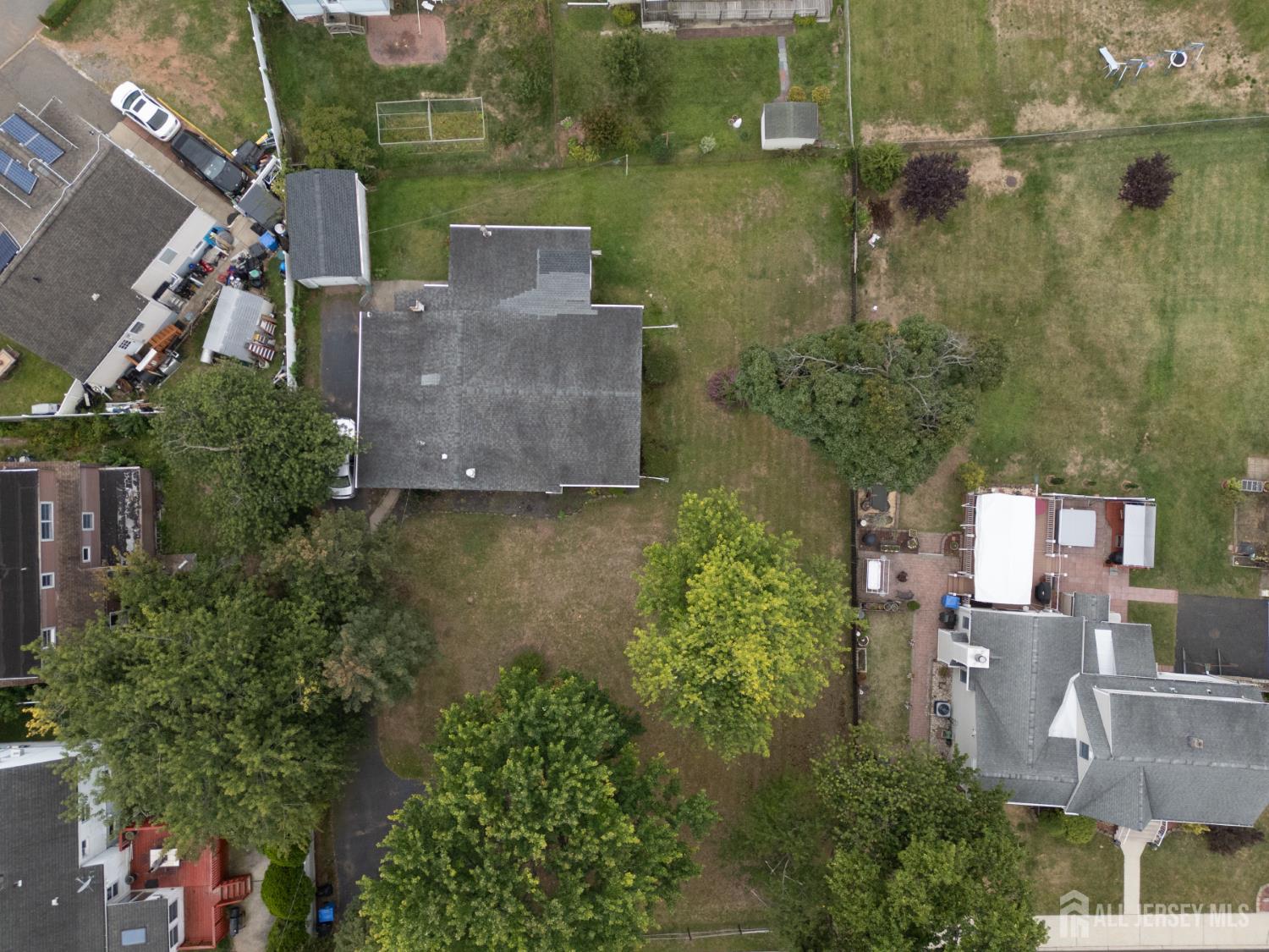 110 Sheppard Place Fords, NJ 08863 - Photo 30 of 34 an aerial view of a house with outdoor space and street view