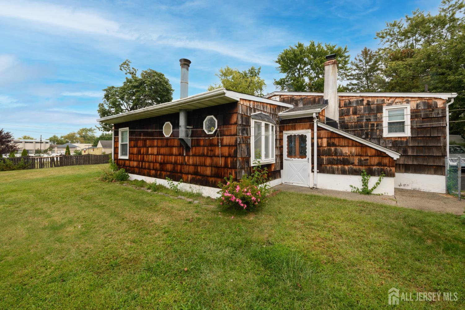 110 Sheppard Place Fords, NJ 08863 - Photo 3 of 34 a view of a house with a yard