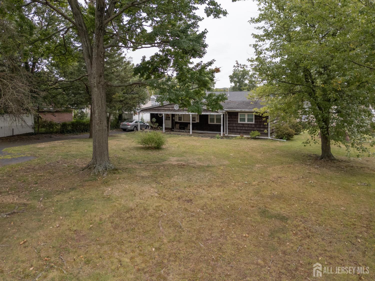 110 Sheppard Place Fords, NJ 08863 - Photo 33 of 34 a view of a house with backyard and trees