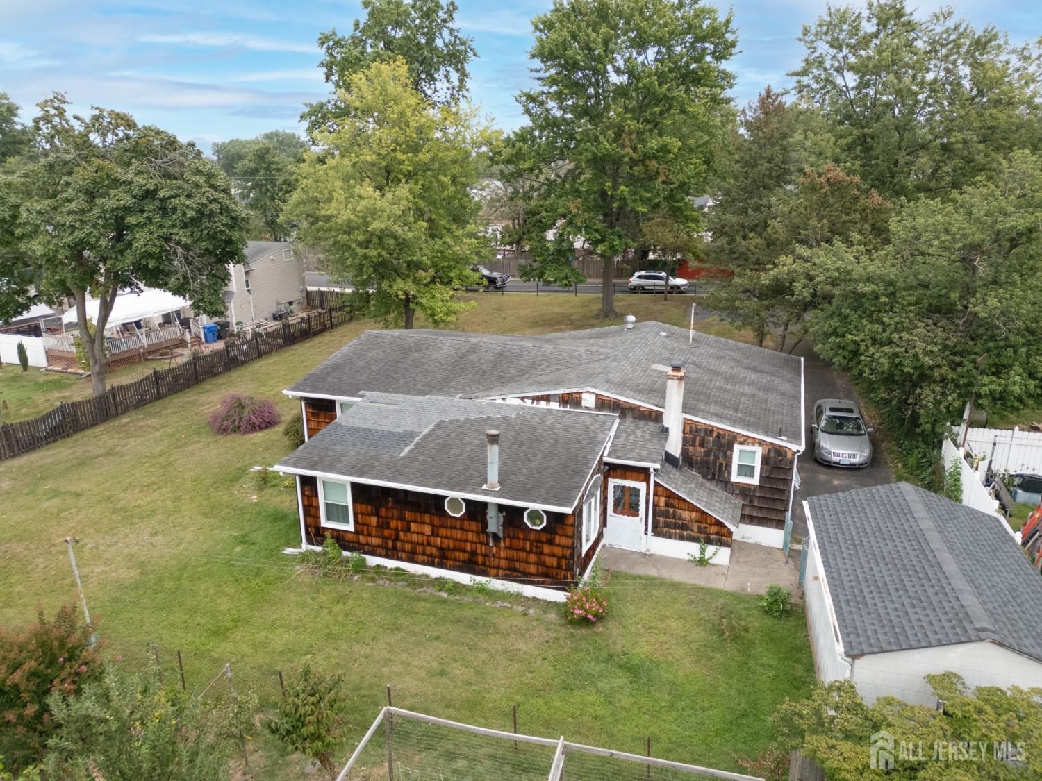 110 Sheppard Place Fords, NJ 08863 - Photo 34 of 34 an aerial view of a house with a big yard