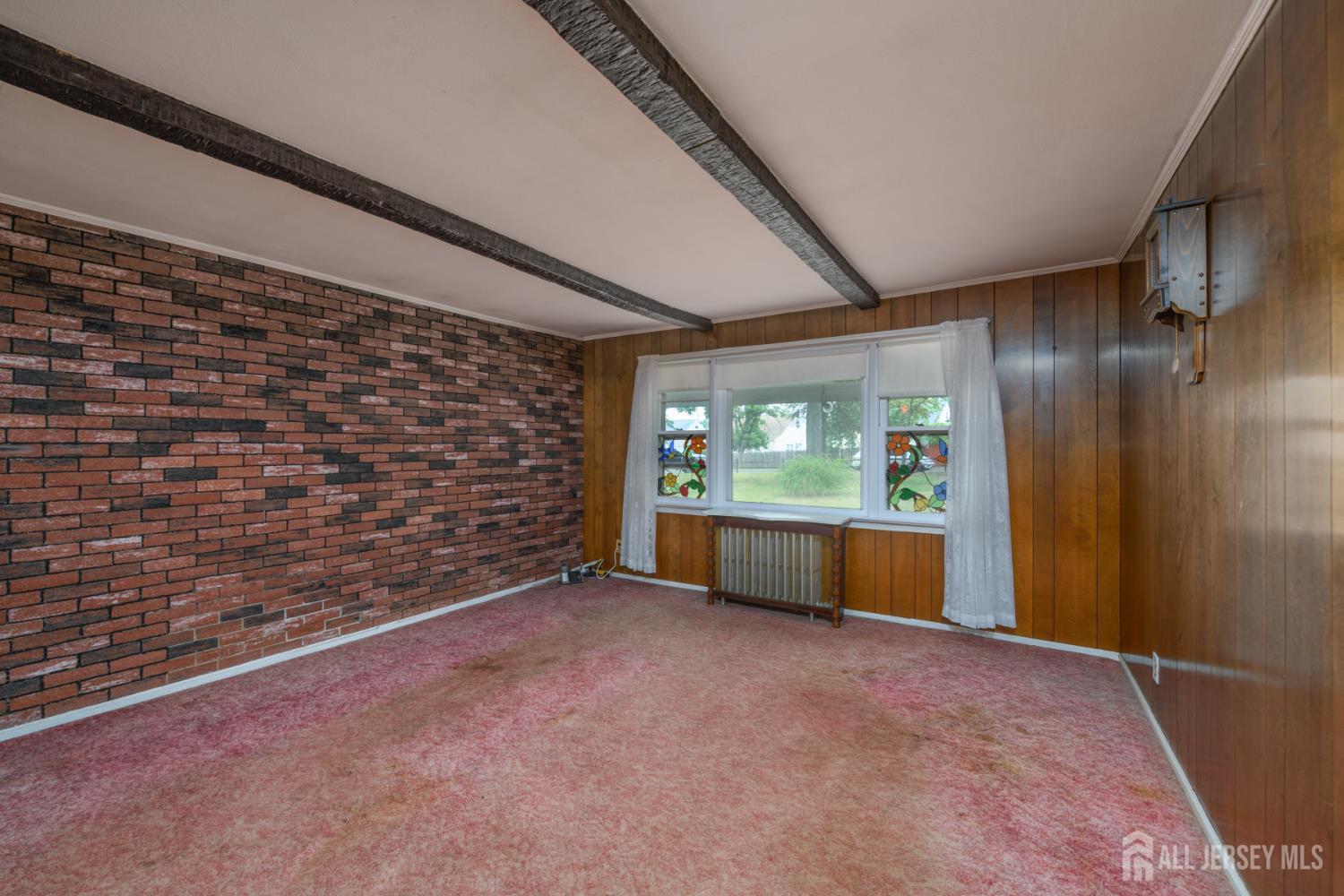 110 Sheppard Place Fords, NJ 08863 - Photo 10 of 34 a view of an empty room with a window