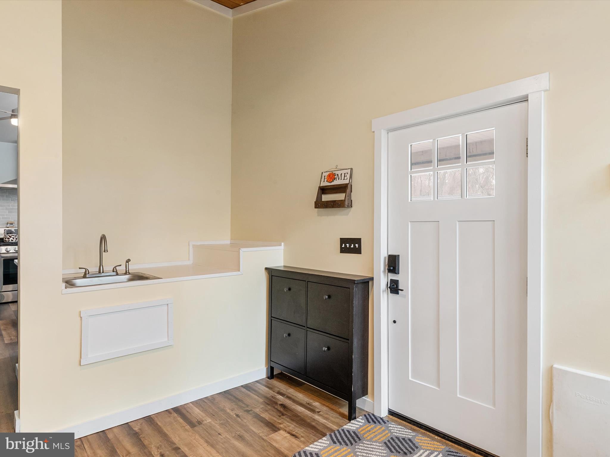 9 Lexington Road Harmans, MD 21077 - Photo 12 of 41 a view of cabinets and wooden floor
