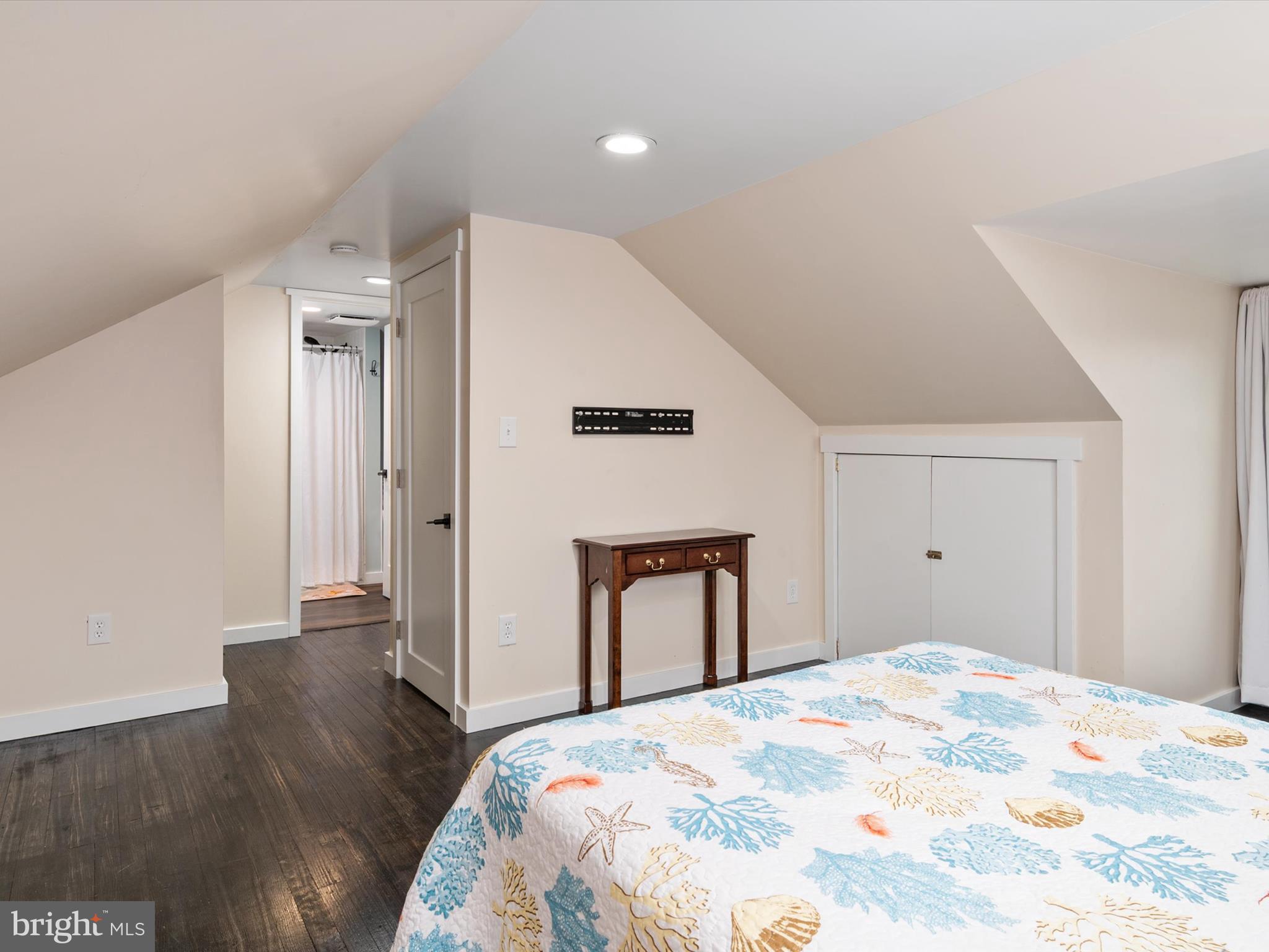9 Lexington Road Harmans, MD 21077 - Photo 23 of 41 a bedroom with a bed and wooden floor