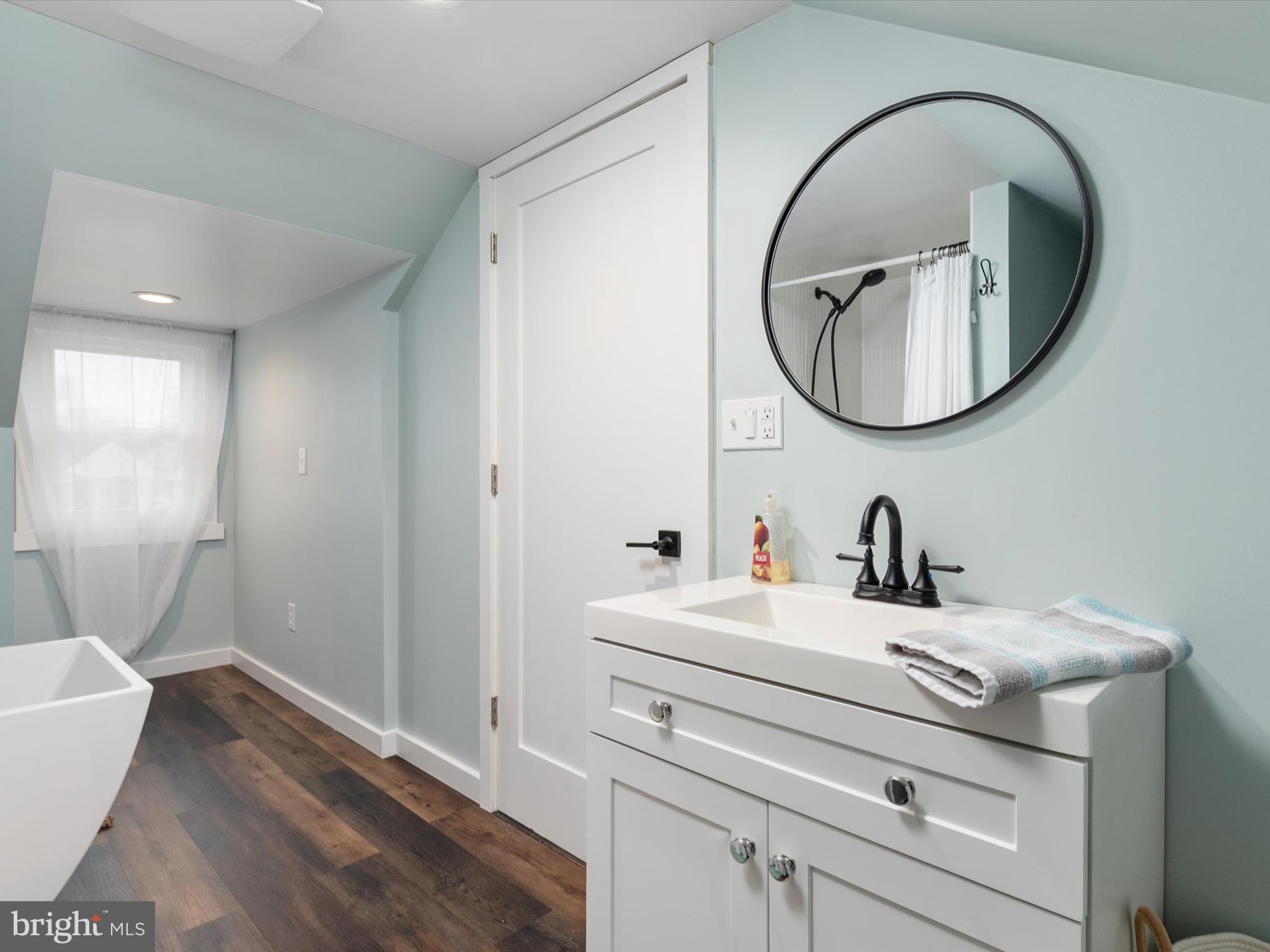 9 Lexington Road Harmans, MD 21077 - Photo 25 of 41 a bathroom with a sink and a mirror