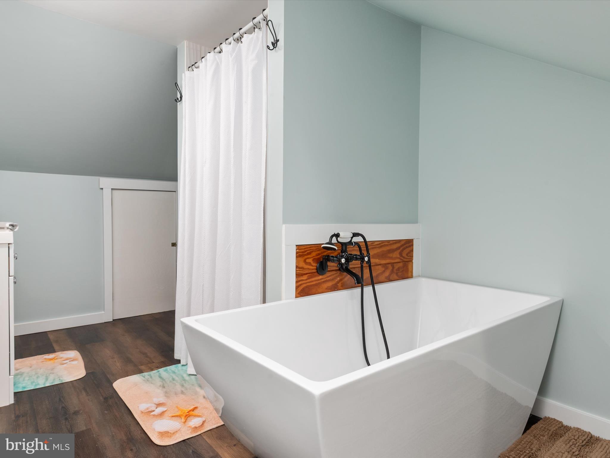 9 Lexington Road Harmans, MD 21077 - Photo 26 of 41 a bathroom with a bathtub and a window